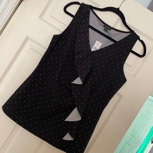 Sleeveless blouse with ruffle